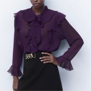 NWT PURPLE TIED BLOUSE WITH RUFFLES.